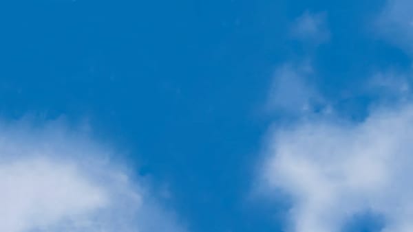 Photo of clouds depicts the shifting and dispersal of chronic neck pain by using techniques pioneered by Dr. John Sarno.