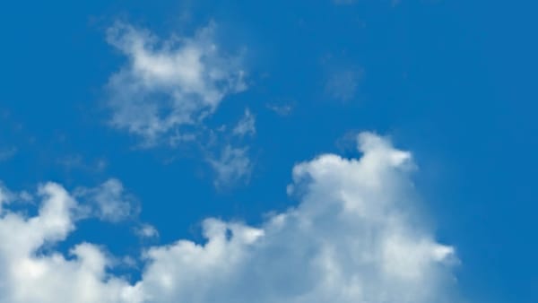 Photo of clouds lifting from the horizon shows how you can remove overthinking to clear up and focus your thinking.