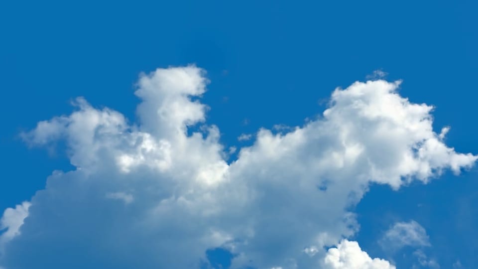 Photo of clouds shows the unexpected health benefits of of walking for back pain relief.