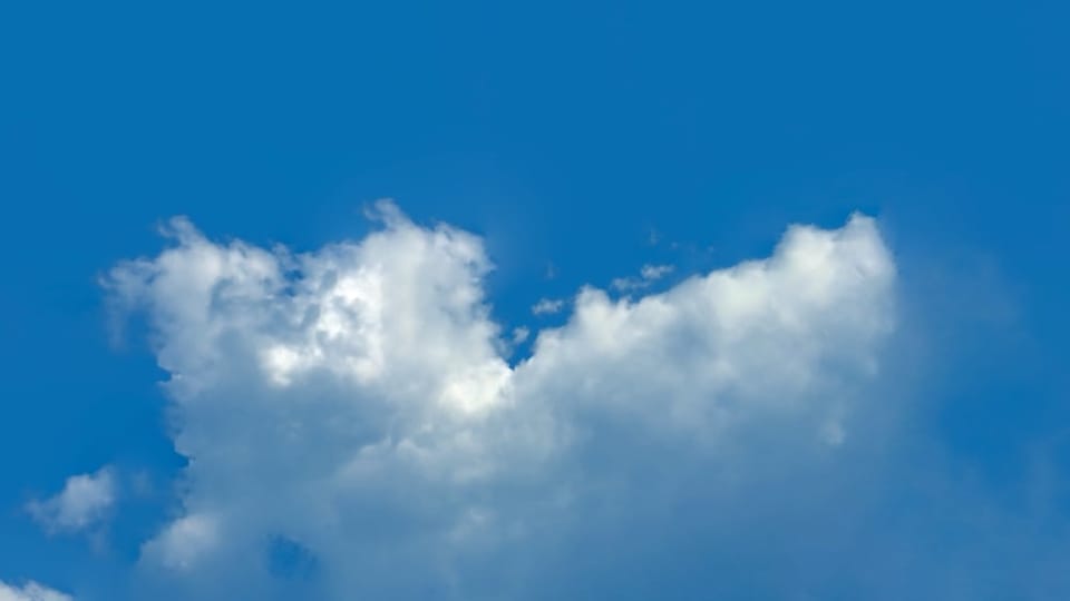 Photo of clouds shows the elimination of back pain and neck pain with three simple exercises.