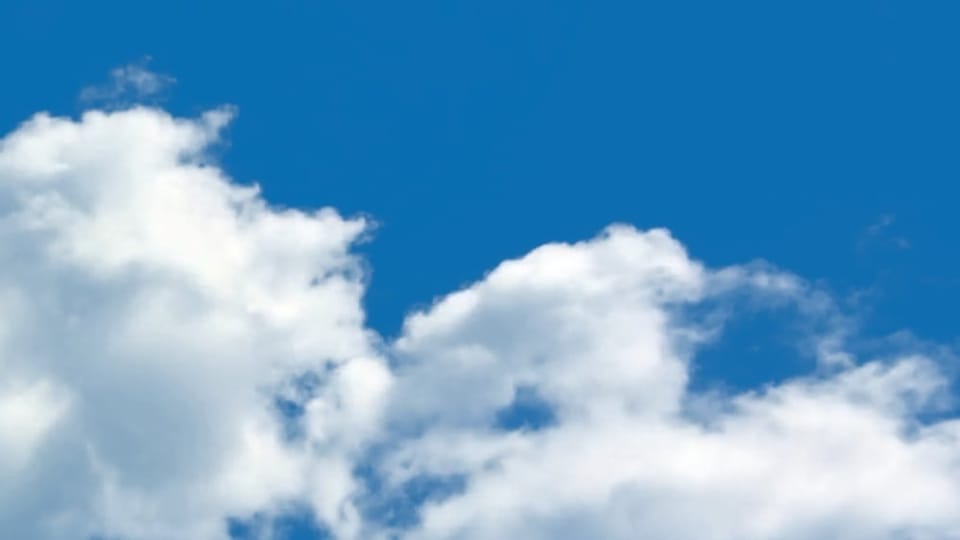 Photo of clouds shows the positive health benefits of overcoming common self-limiting beliefs.